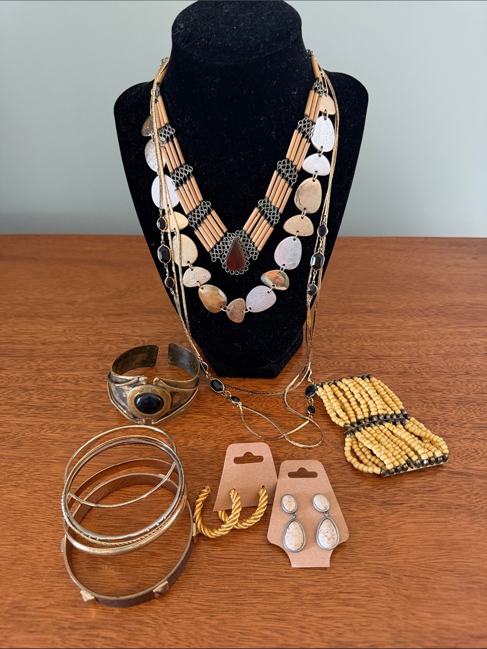 Lot of Jewelry including 3 necklaces, 6 bracelets and 2 pairs of earrings.